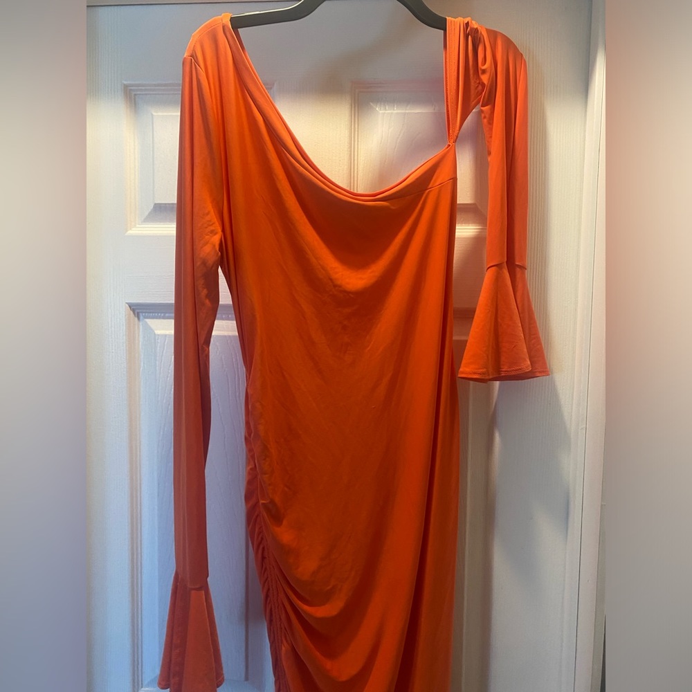 Long orange dress. One shoulder.